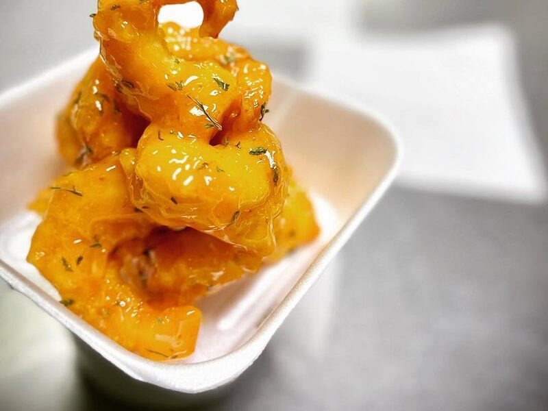 Bamboo Hibachi's bang bang shrimp in a small takeout cup